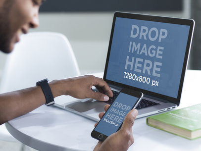 Young Man Working on His MacBook Pro Laptop and iPhone 6 Mockup